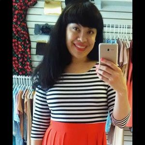 Black white striped dress with red skirt. Frenchy